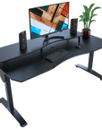 Black rectangular desk with computer setup on a white background